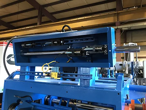 Blue machine enclosure with its upper section open