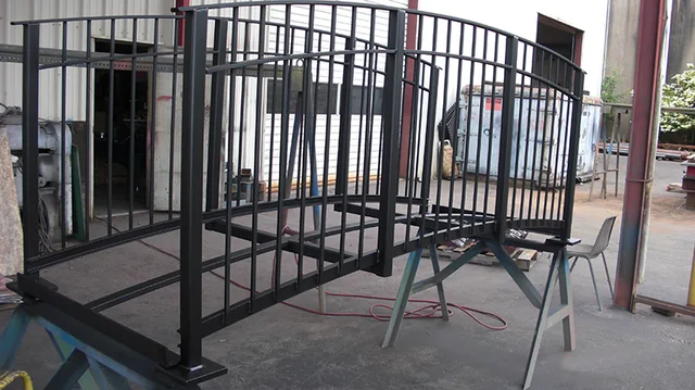 Metal footbridge frame with upright railings